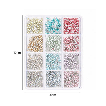 NF x mixed colour round flatback crystal nail rhinestones in a clear 12-grid box, with dimensions marked 12cm by 8cm.