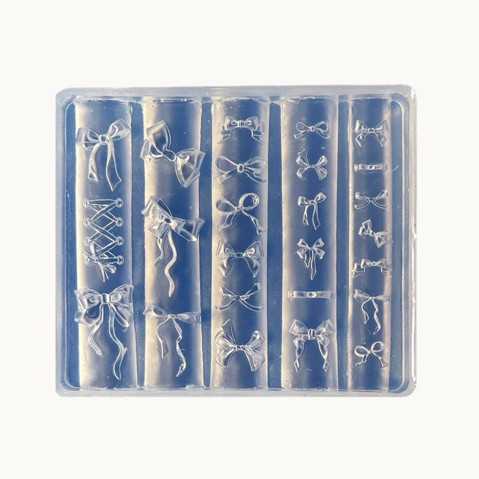 NF Select 3D Bow & Ribbon Nail Mold, clear silicone mold for making various styles of bow, lace-up and ribbon nail charms