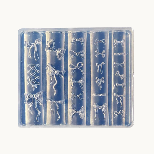 NF Select 3D Bow & Ribbon Nail Mold, clear silicone mold for making various styles of bow, lace-up and ribbon nail charms