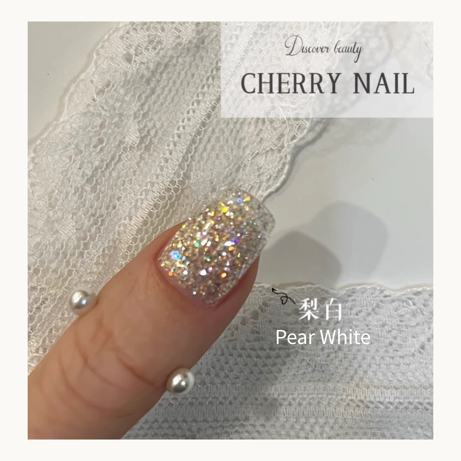 Pear White glitter applied on a nail, showing a sophisticated, fine white iridescent shimmer like crushed pearls.