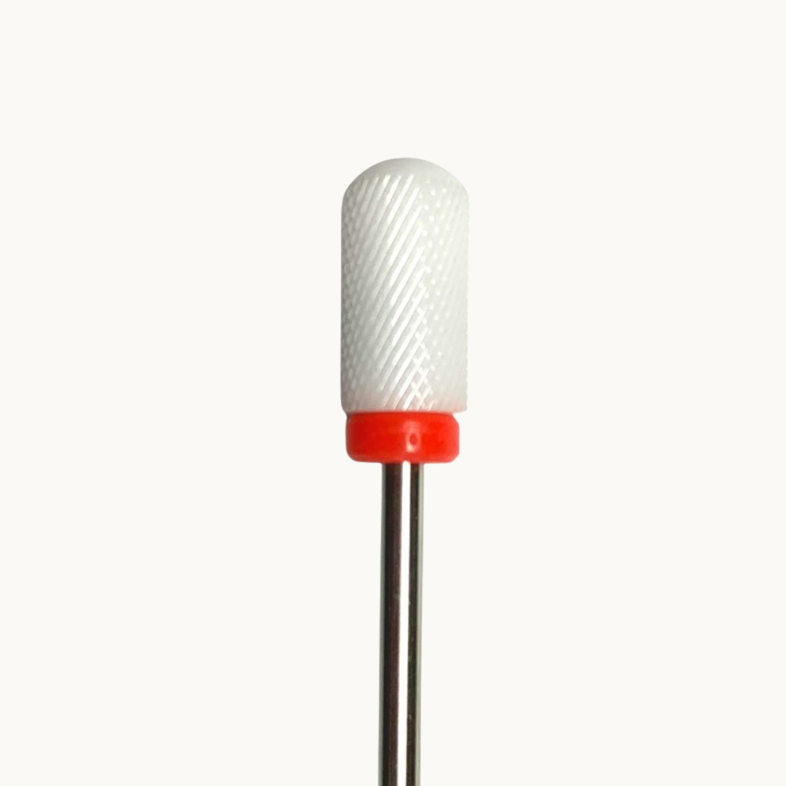 Professional ceramic nail drill bit with fine grit rounded safety barrel shape for precise finishing, surface smoothing, and safe cuticle edge protection during final refining work