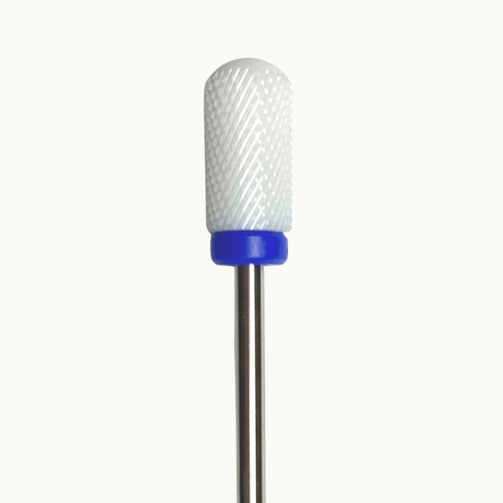 Professional ceramic nail drill bit with medium grit rounded safety barrel shape for controlled gel removal, structure refining, surface smoothing, and reduced cuticle edge contact risk