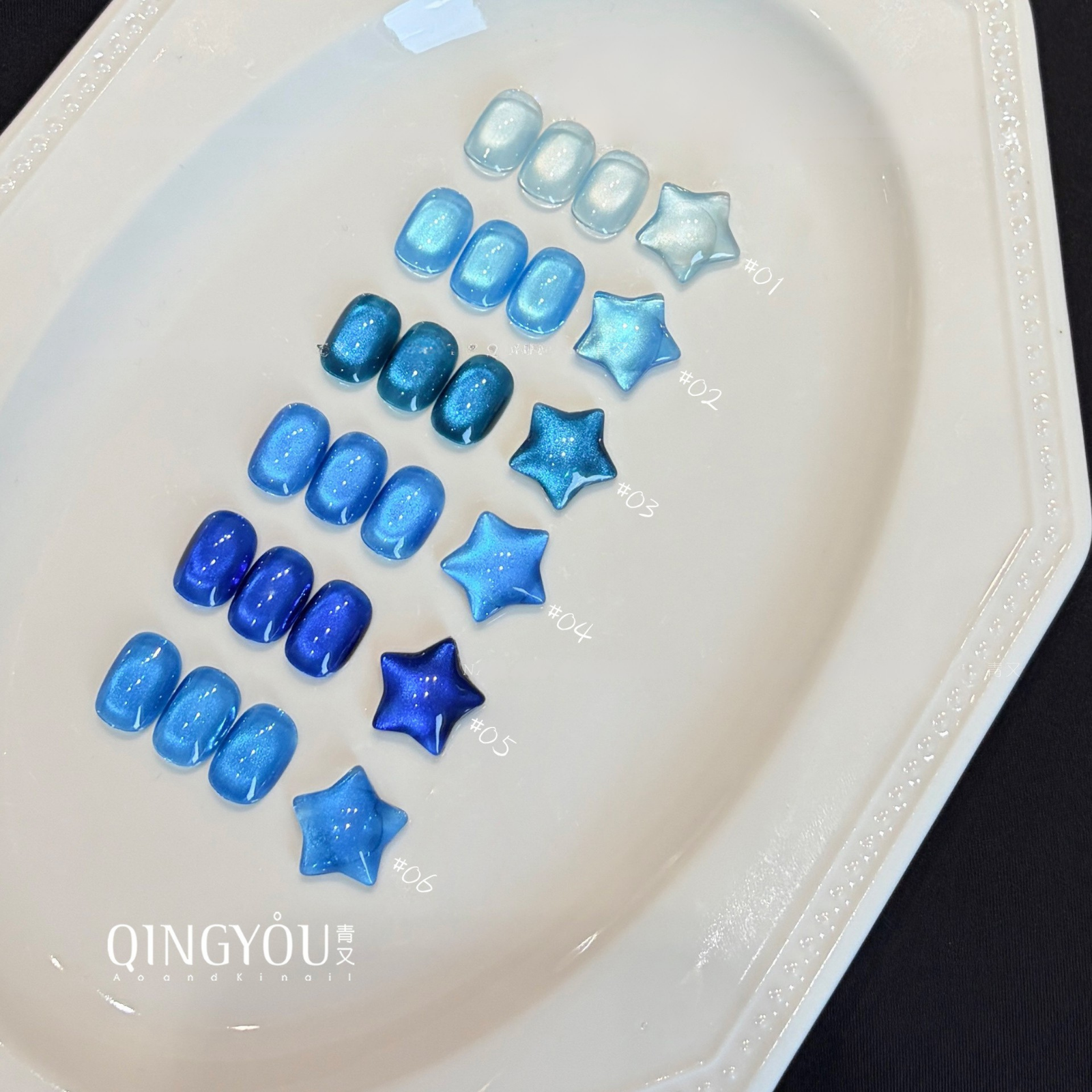 Six QINGYOU blue gel polish shades displayed on nail swatches