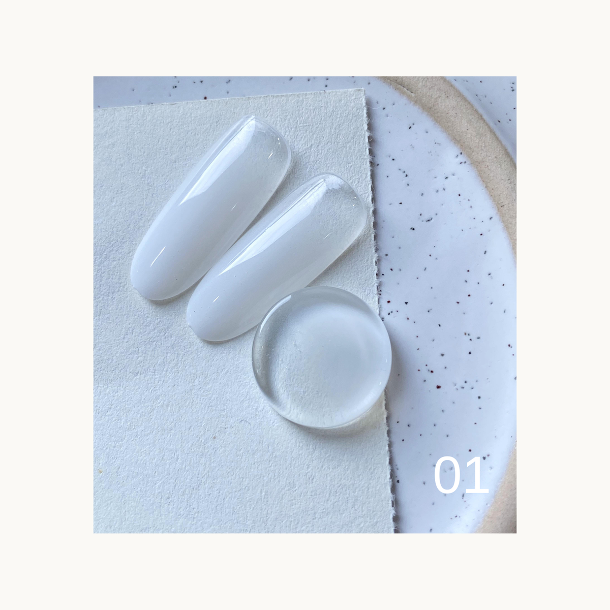 Glossy white gel color swatches labeled 01