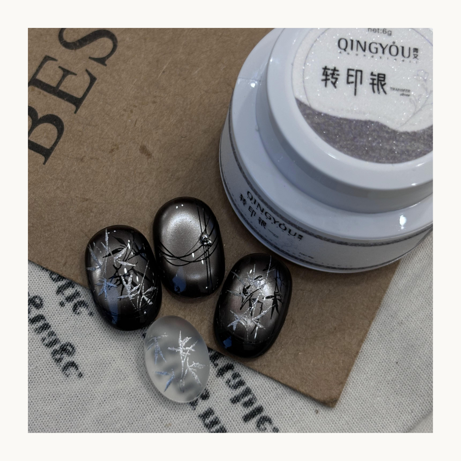 Elegant vintage floral stamped nail designs created with QingYou gold transfer gel on neutral matte bases.