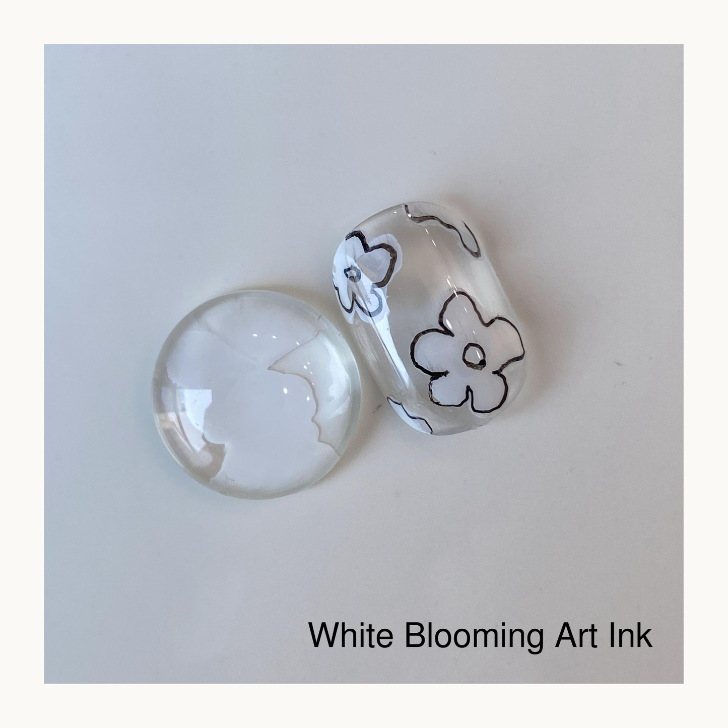 Qingyou white blooming gel nail art ink used to create blooming flower nail design on clear nail tip