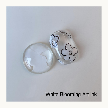 Qingyou white blooming gel nail art ink used to create blooming flower nail design on clear nail tip