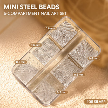 Silver mini steel bead nail art set #06 with six compartments featuring 0.5 mm, 0.6 mm and 0.8 mm beads.