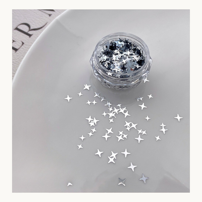 Silver star nail art glitter with chrome metallic finish, luxury nail accessories for salon and DIY nails in USA and Canada