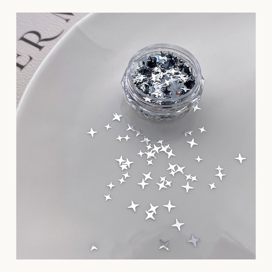 Silver star nail art glitter with chrome metallic finish, luxury nail accessories for salon and DIY nails in USA and Canada