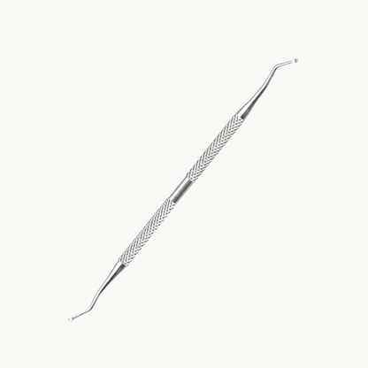 Stainless steel double-ended nail lifter and cleaner with angled curved tips and textured grips for precise nail care.