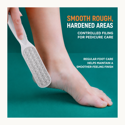 White foot file applied to the side of a bare foot in a pedicure demonstration