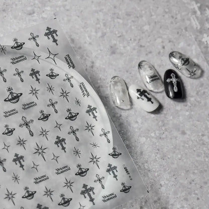 Black celestial cross nail stickers from tomoni 2867 on nail tips