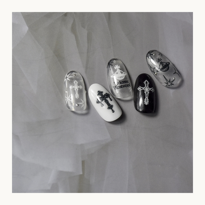 Black and white celestial sticker designs shown on clear and painted sample nails