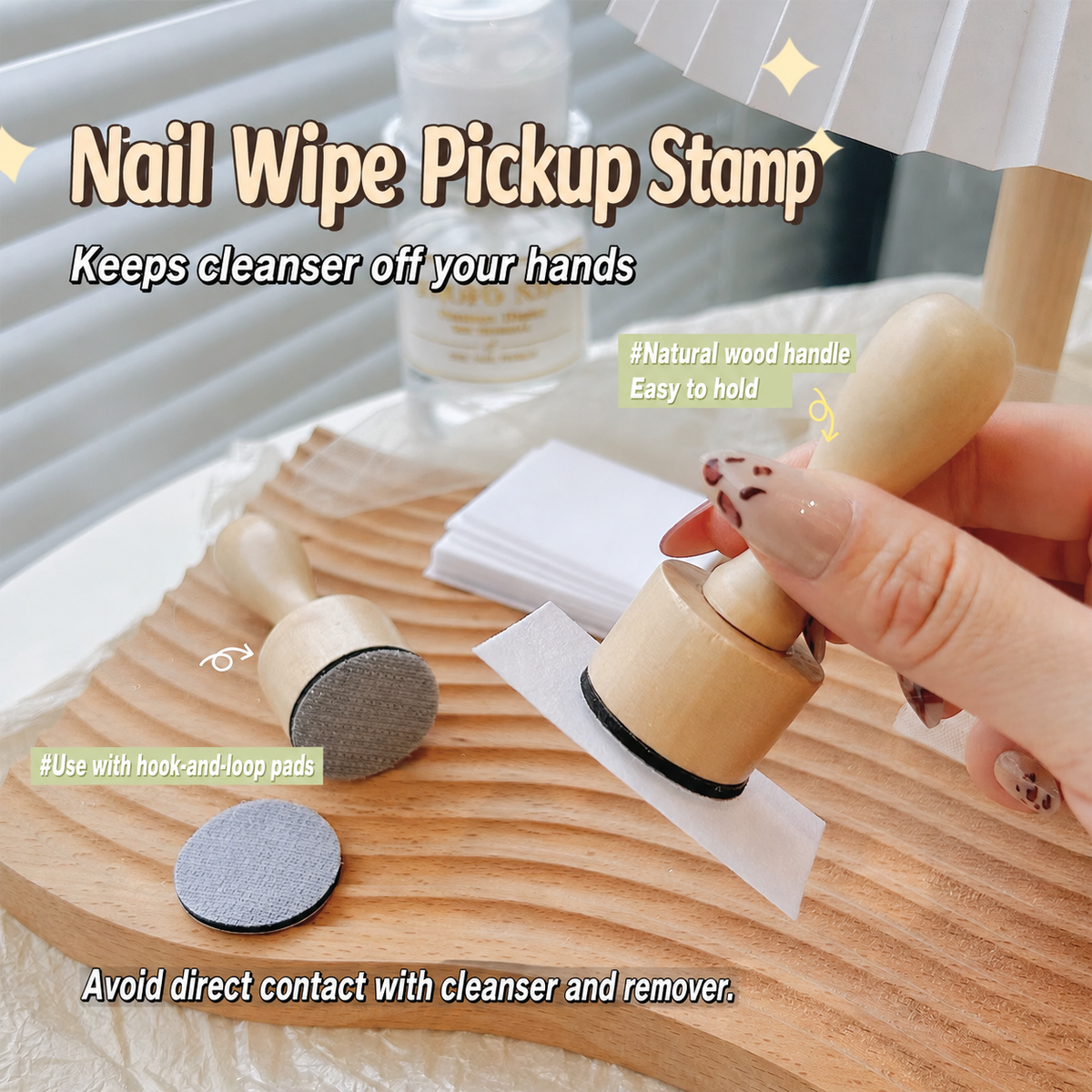 Wooden nail wipe pickup stamp with hook-and-loop pad in use