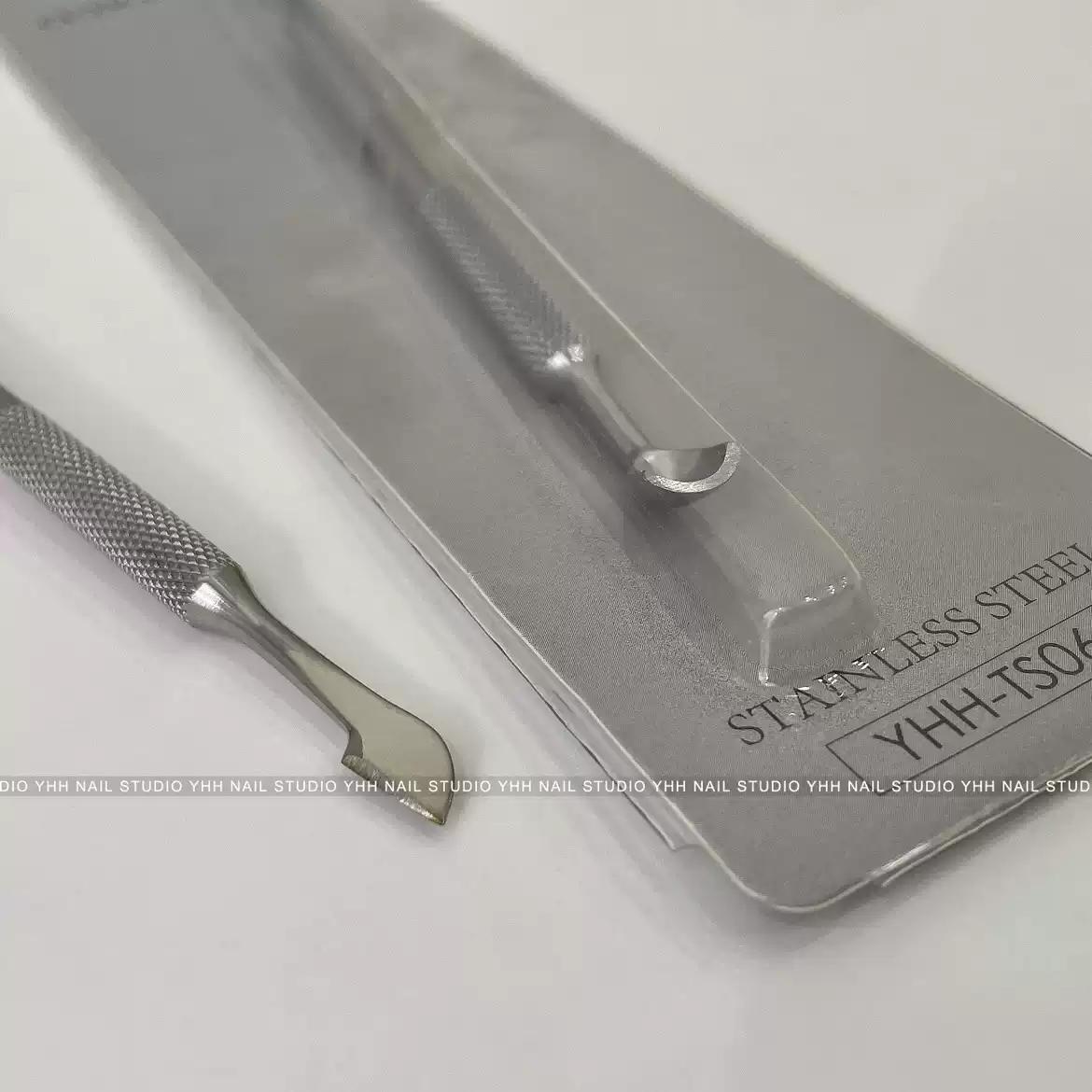 Close-up of YHH stainless steel cuticle pusher