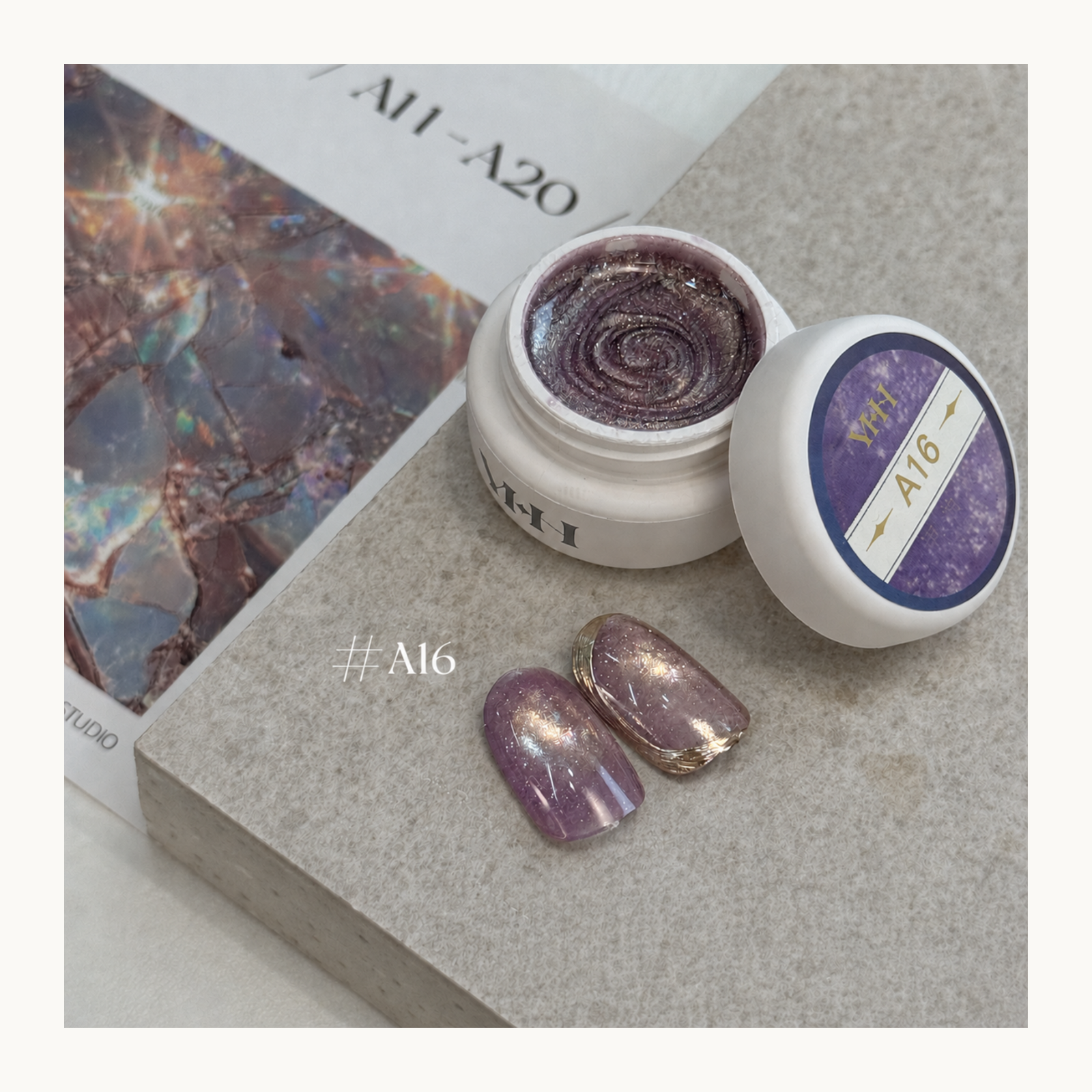 YHH Ethereal Glow A16 soft lavender magnetic cat eye gel with delicate shimmer and a multidimensional salon finish.
