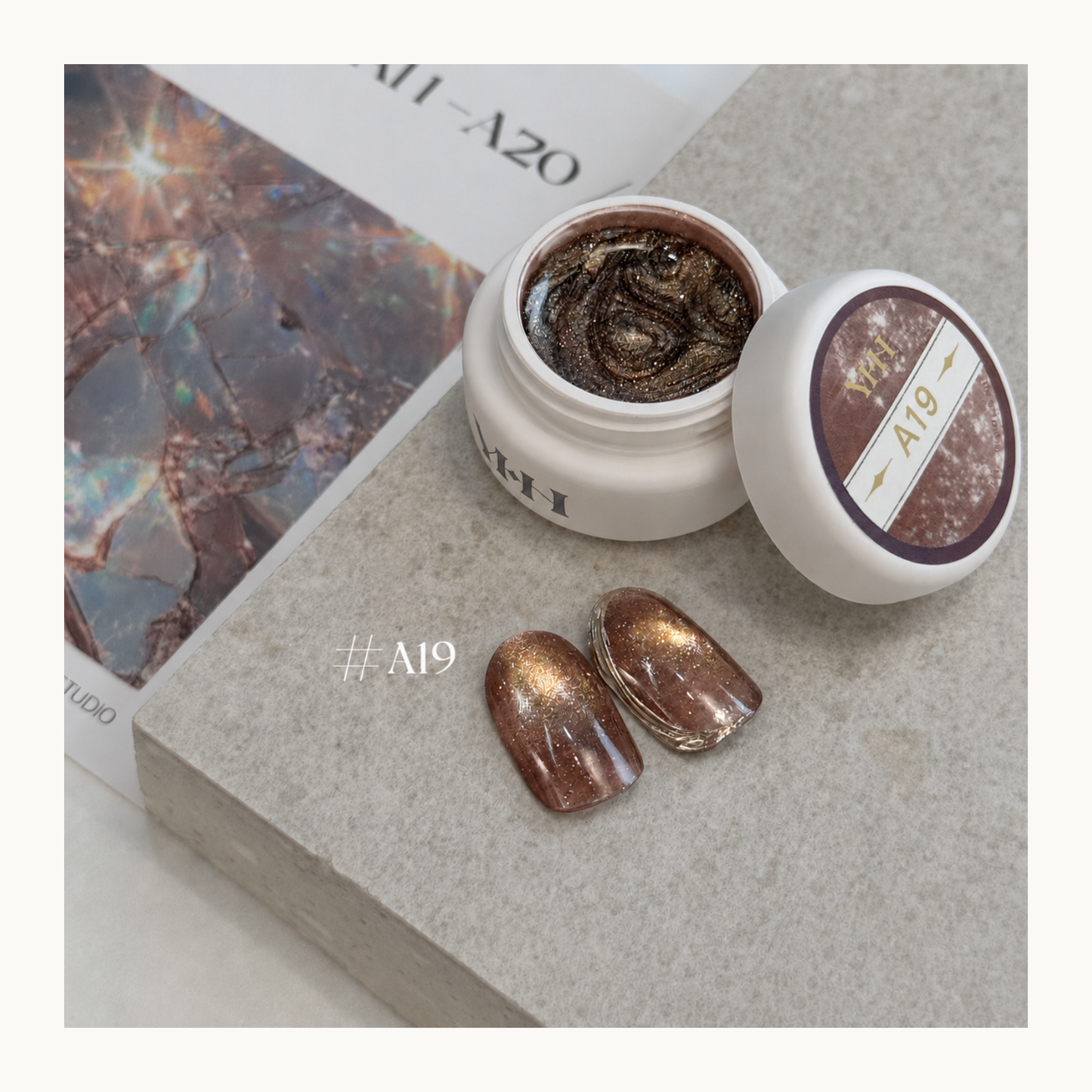 YHH Ethereal Glow A19 bronze brown magnetic cat eye gel with fine golden shimmer and a warm dimensional nail finish.