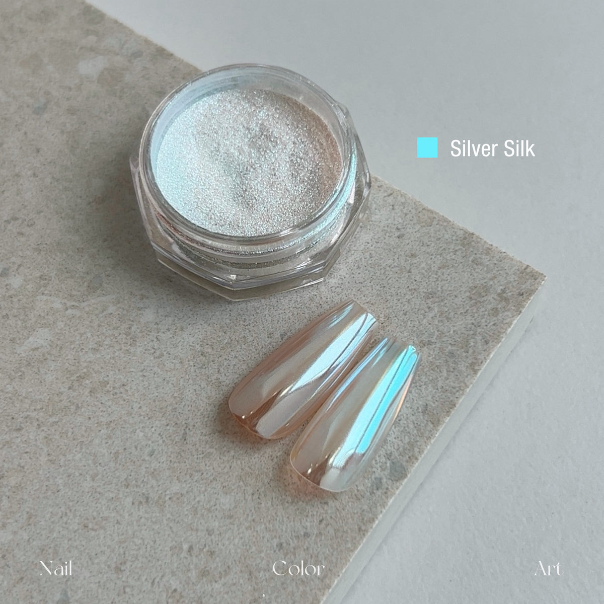 YHH Moonlight Silk Chrome Powder Silver Silk, silk chrome nail powder jar with nail swatch, cool blue iridescent satin pearl finish for gel manicure nail art