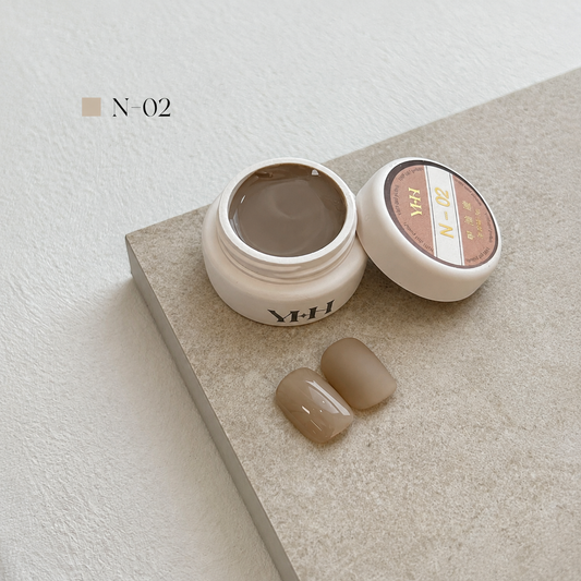 Taupe beige nail color gel pot with glossy and matte swatches