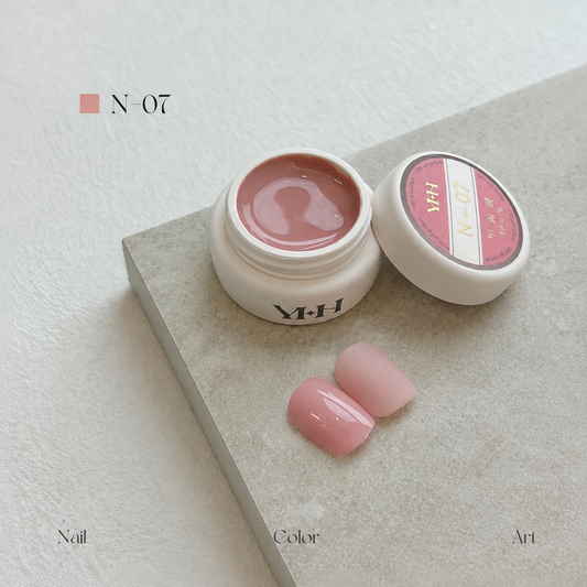 Soft blush pink nail color gel pot with glossy and matte swatches