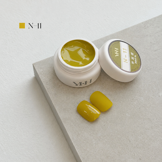 Mustard yellow nail color gel pot with glossy and matte swatches