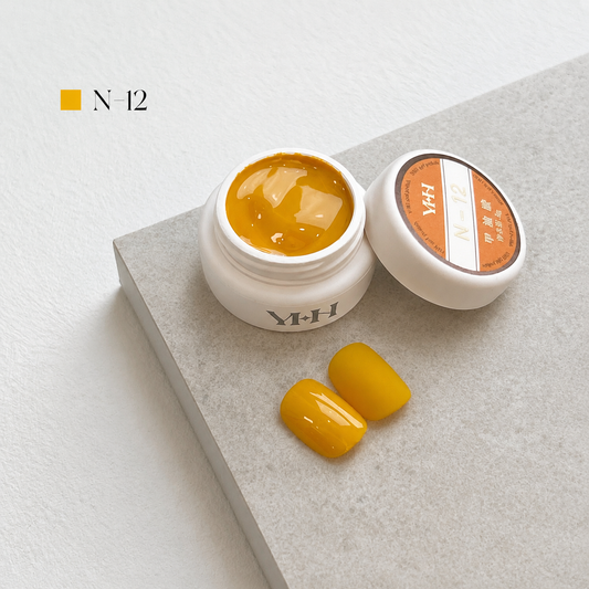 Golden yellow nail color gel pot with glossy and matte swatches