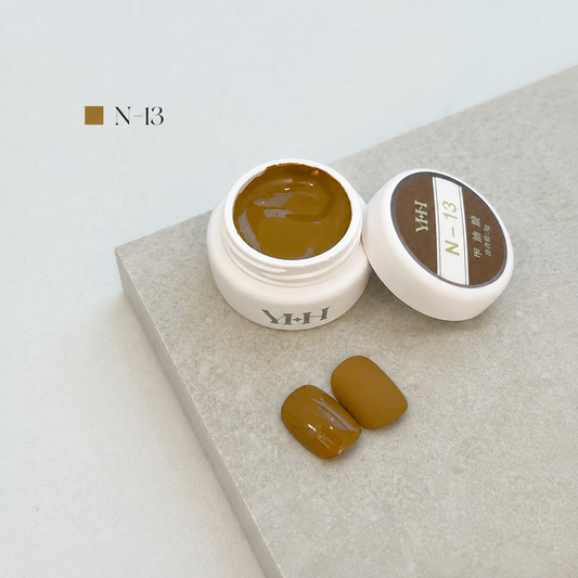 Ochre caramel brown nail color gel pot with glossy and matte swatches