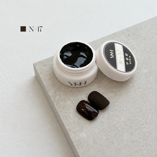 Near-black espresso brown nail color gel pot with glossy and matte swatches