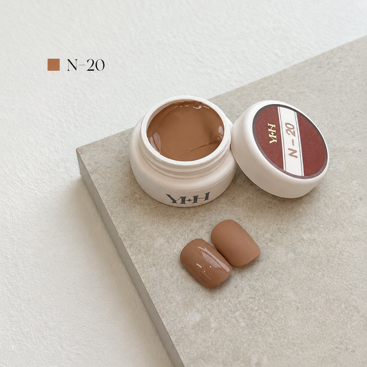 Nude beige brown nail color gel pot with glossy and matte swatches