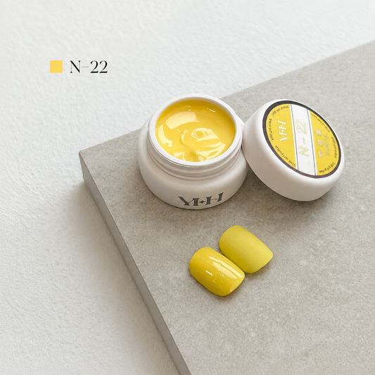 Bright yellow nail color gel pot with glossy and matte swatches