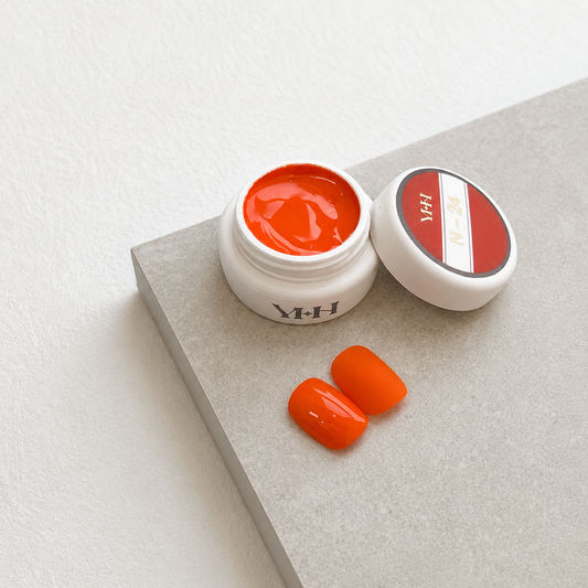 Vivid neon orange nail color gel pot with glossy and matte swatches