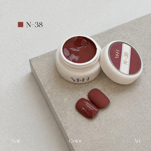 Warm terracotta gel nail color jar with two terracotta swatches