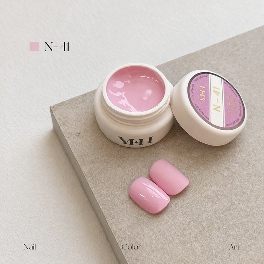 Soft blush pink gel nail color jar with two pink swatches