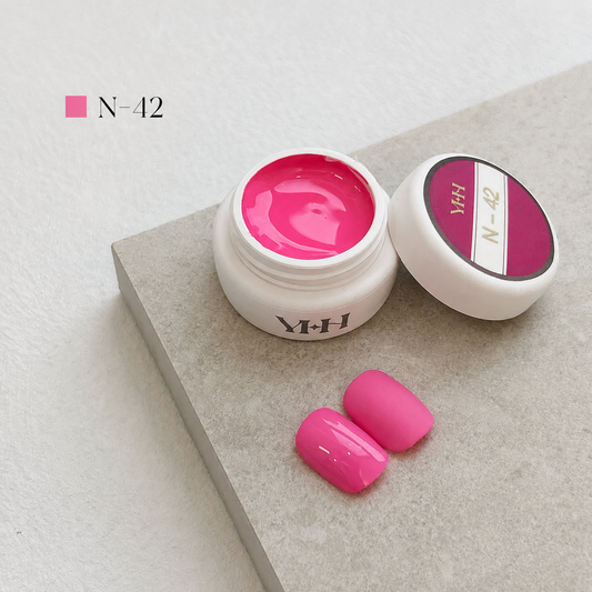 Bright pink gel nail color jar with two pink swatches