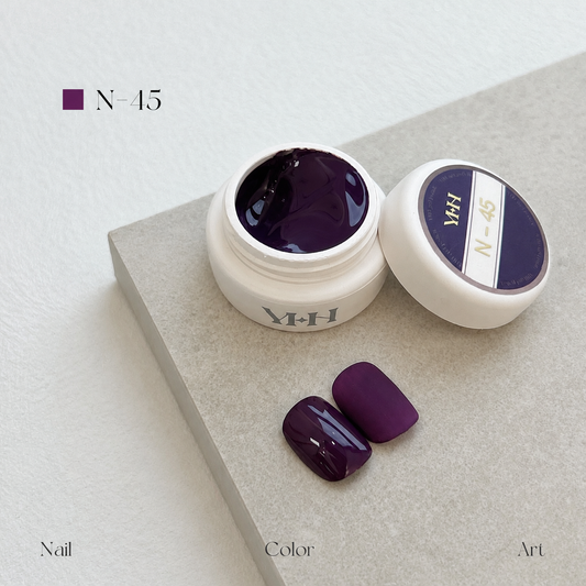 Deep plum-purple gel nail color jar with two purple swatches