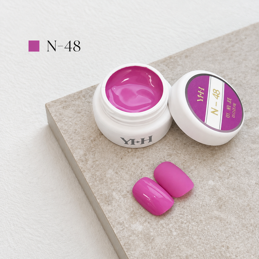 Dusty rose-pink gel nail color jar with two pink swatches