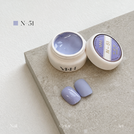 Misty lavender-blue gel nail color jar with two pale lavender swatches