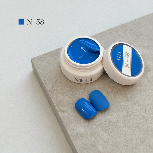 Sky-blue gel nail color jar with two blue swatches