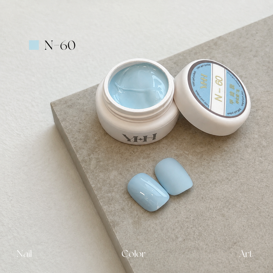 Ice-blue gel nail color jar with two pale blue swatches