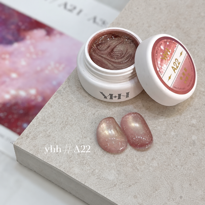 YHH Xinglan Opal Flake Cat Eye Gel 5 g, shade A22, shown in the jar with matching cat-eye swatches.