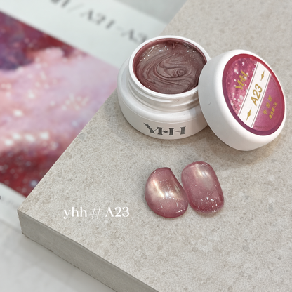 YHH Xinglan Opal Flake Cat Eye Gel 5 g, shade A23, shown in the jar with matching cat-eye swatches.