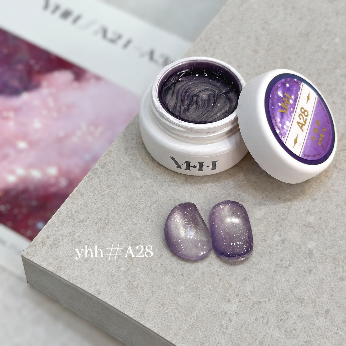 YHH Xinglan Opal Flake Cat Eye Gel 5 g, shade A28, shown in the jar with matching cat-eye swatches.