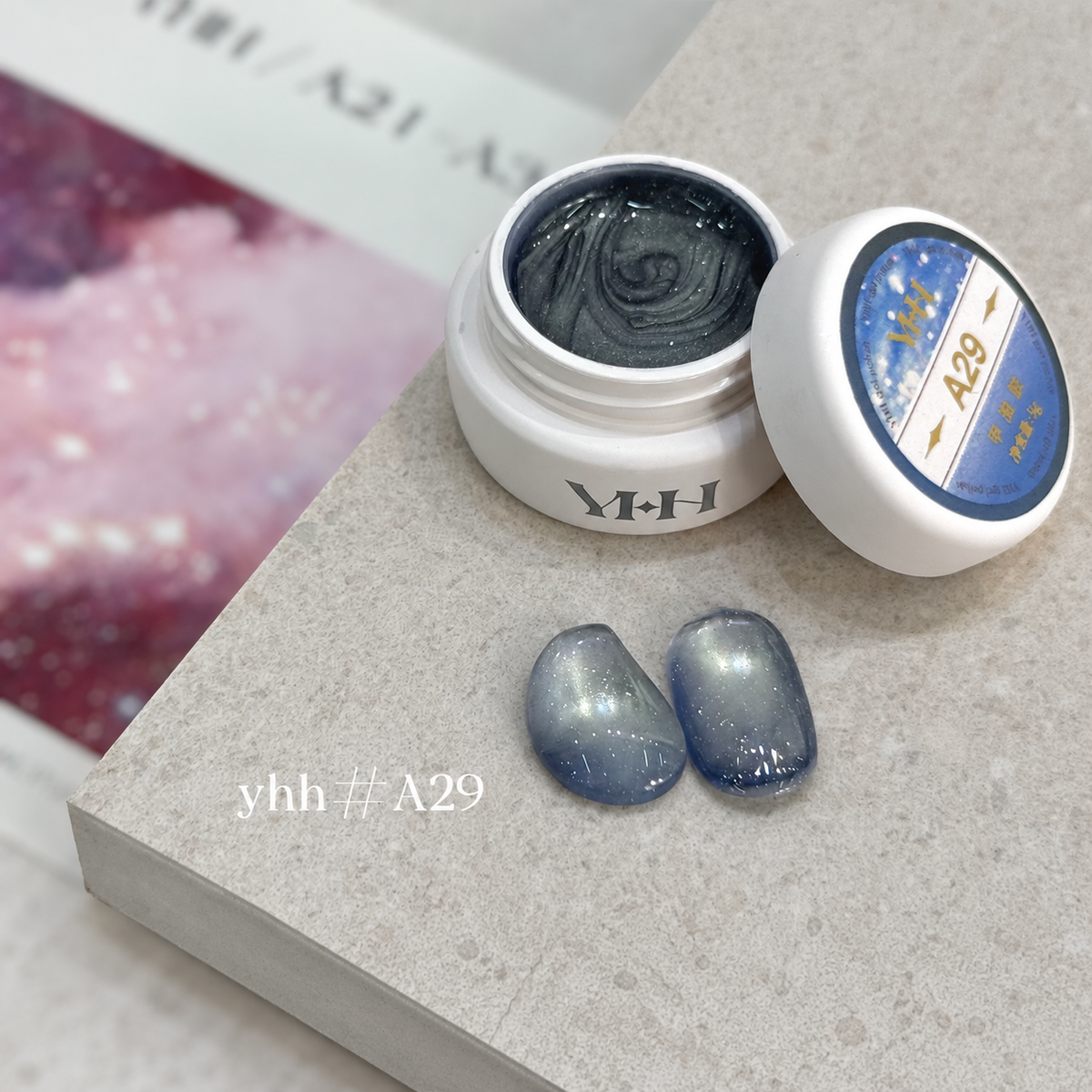 YHH Xinglan Opal Flake Cat Eye Gel 5 g, shade A29, shown in the jar with matching cat-eye swatches.