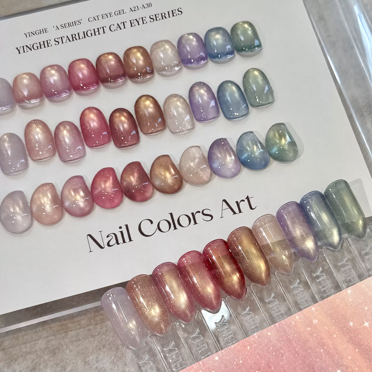 YHH Xinglan A21–A30 opal flake cat-eye gel swatches in a range of shades.