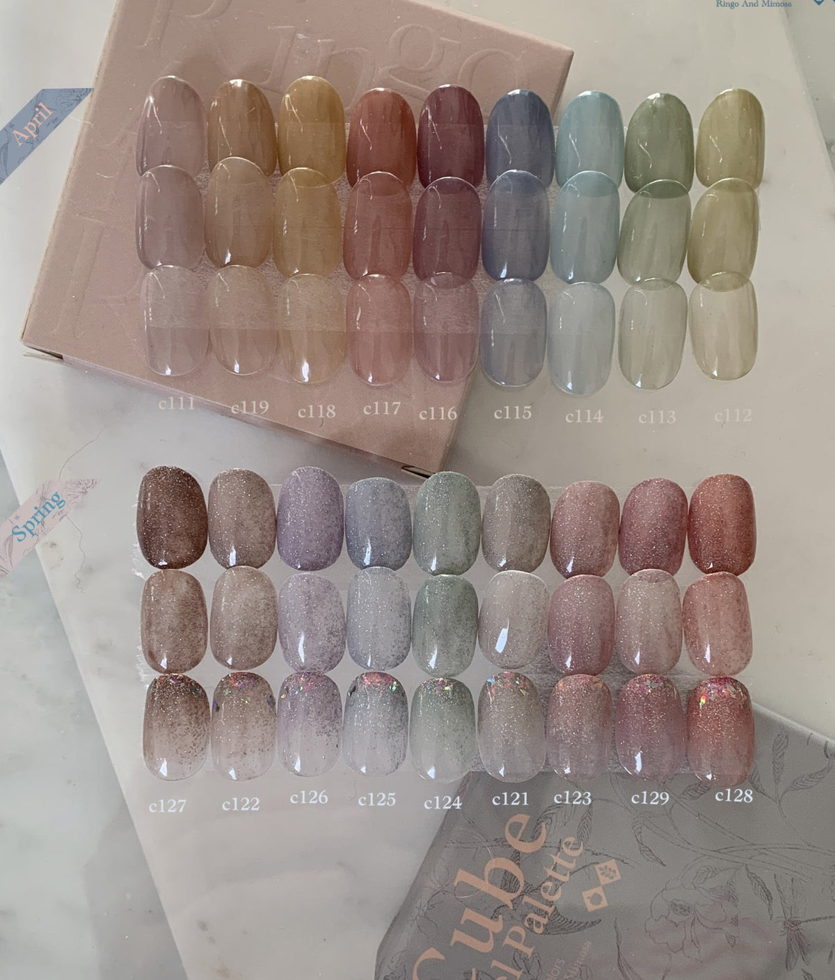 Gel nail palette chart showing pastel and glitter swatches