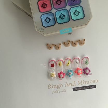 Gumi soft gel palette with bear accents and decorated nail tips