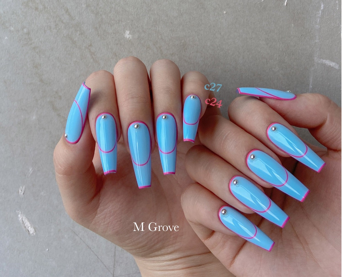Gumi soft gel palette manicure with blue nails, pink edging, and silver studs