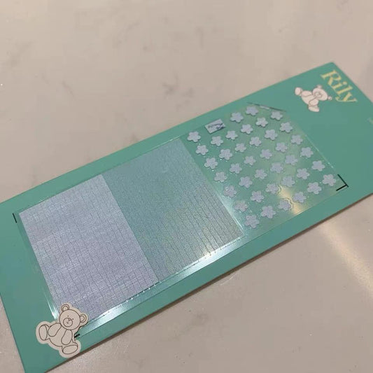 Mint nail sticker card with pale blue flowers and blue sticker panels