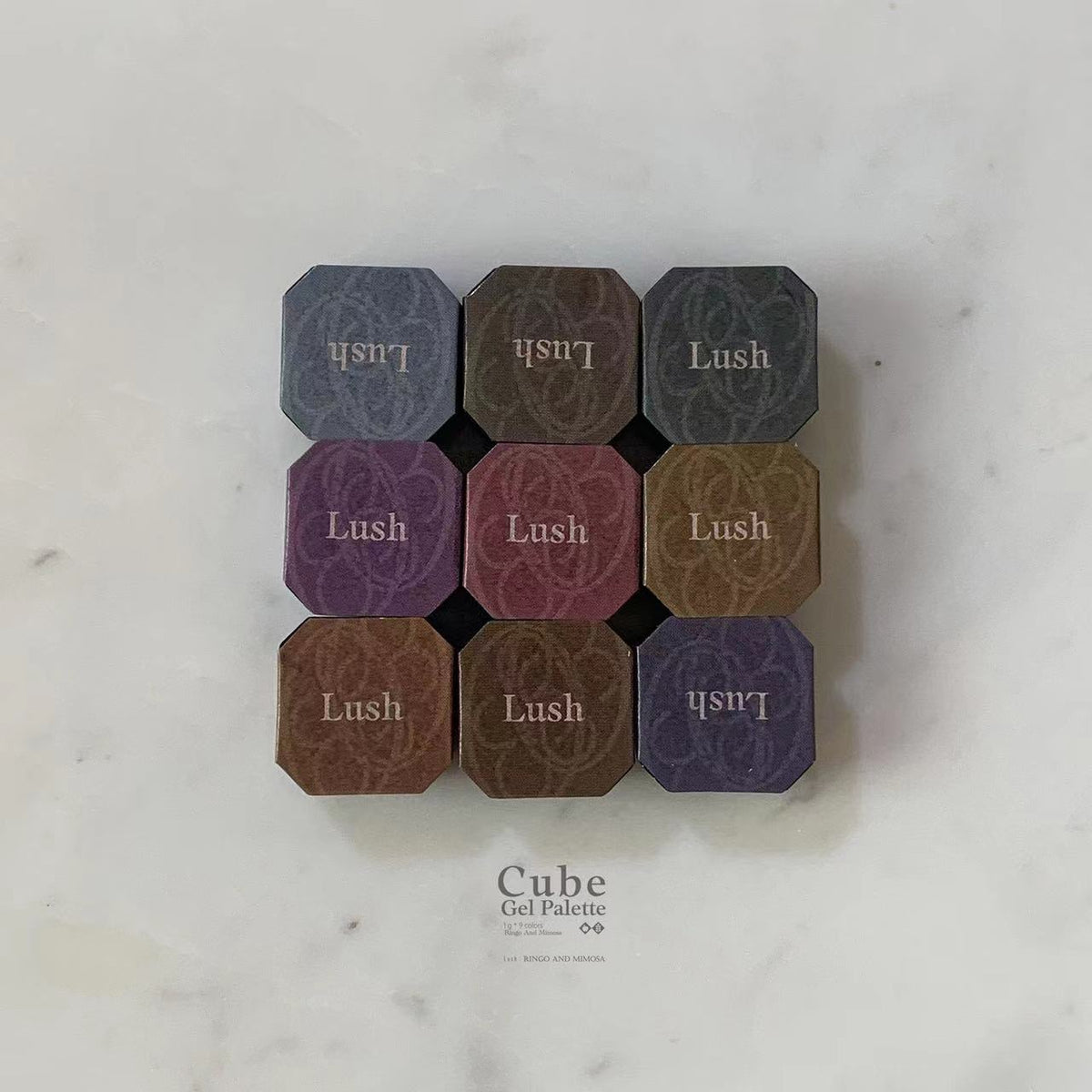 Nine Lush soft gel color pans arranged in a grid